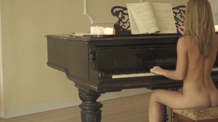 Naked young pianist