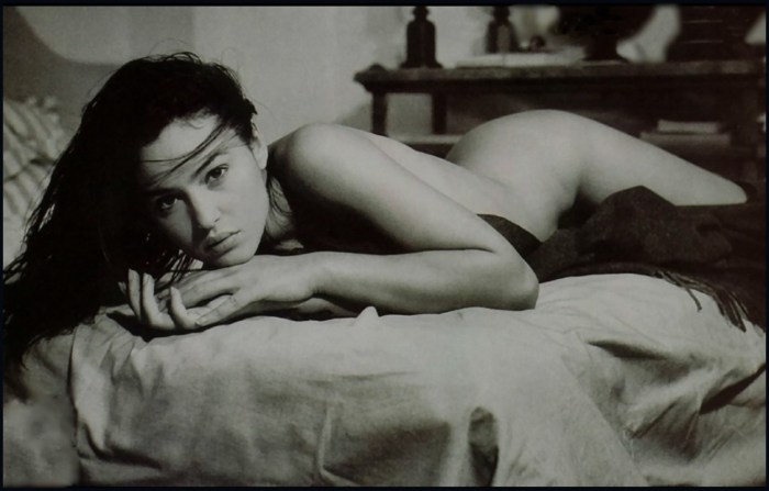 Monica Bellucci in bed