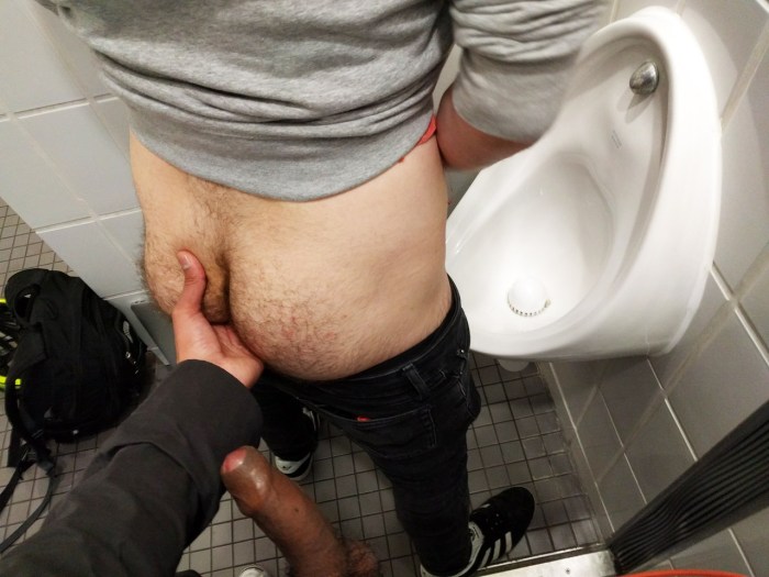 Guys hung in a public toilet