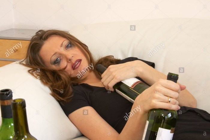 Drunk woman lying on the street