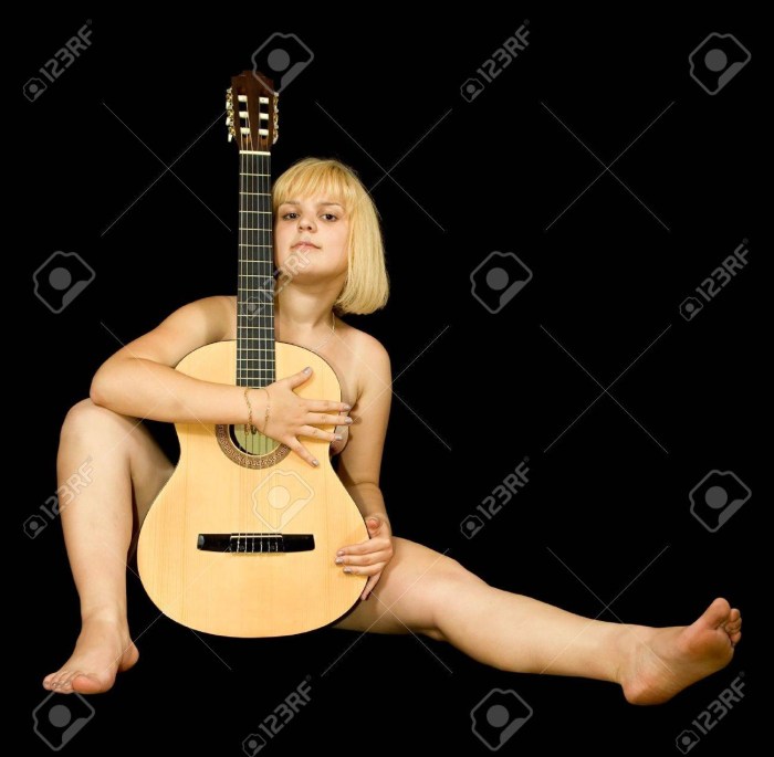 Guitar between the legs