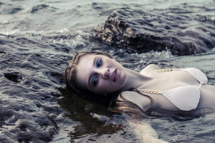 Girl in a swimsuit in water