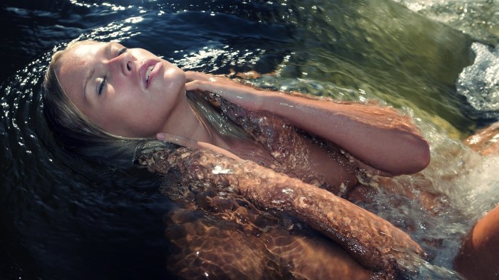 Girls swim in the lake