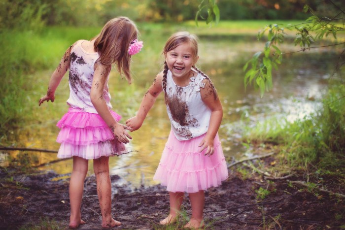 Girl in a dress in mud