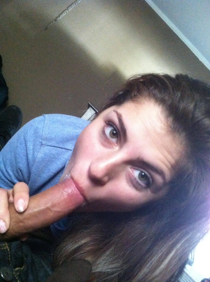 Girl with a member in the mouth Selfie