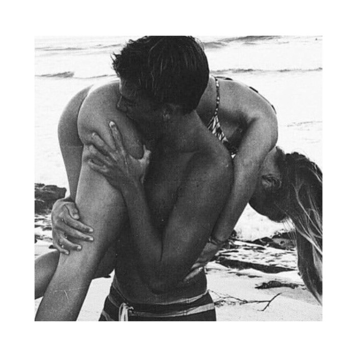 Passionate kiss on the beach