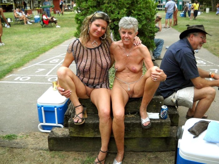 Naked mature in a car