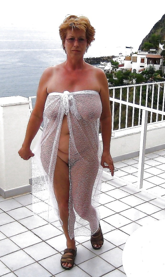 Mature in a transparent dress