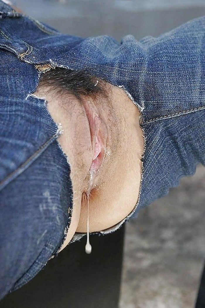 In torn jeans without panties