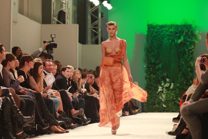 Fashion show with bare breasts