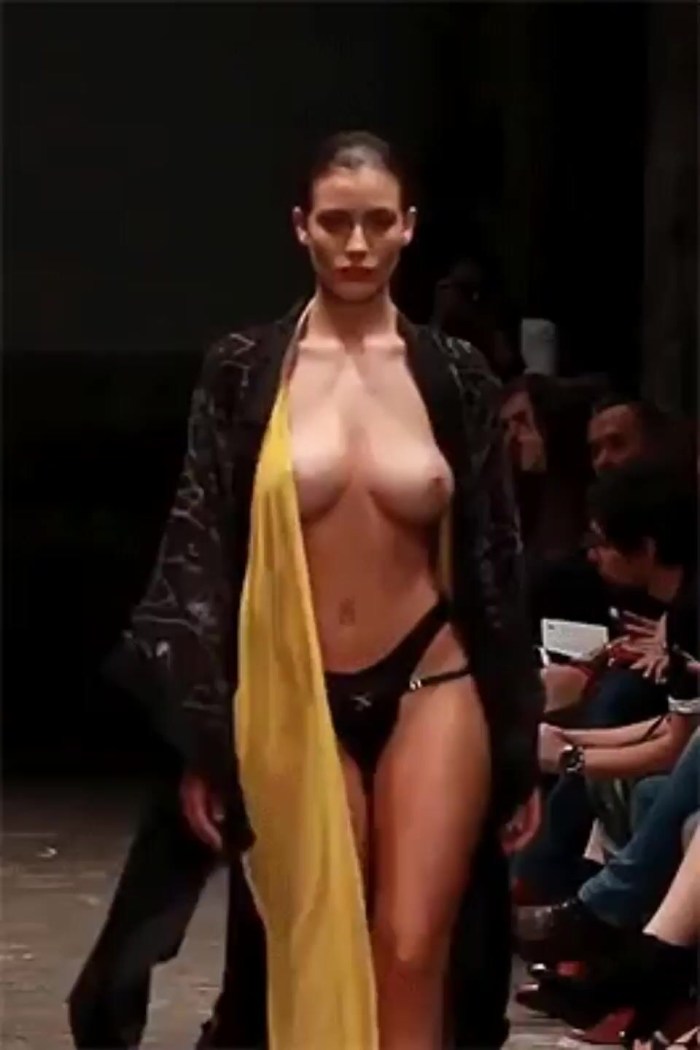 Fashion show with bare breasts