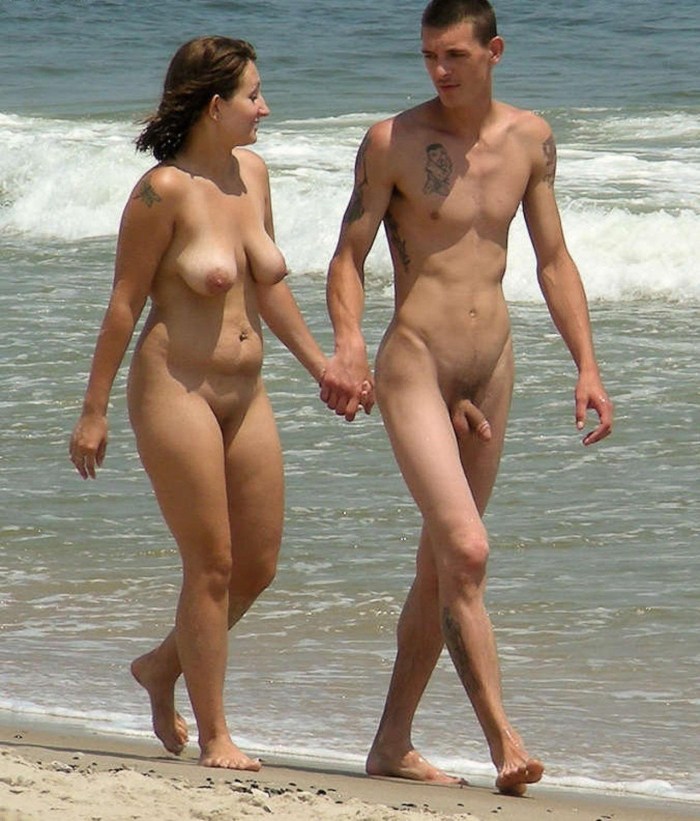Naked men and women on the beach