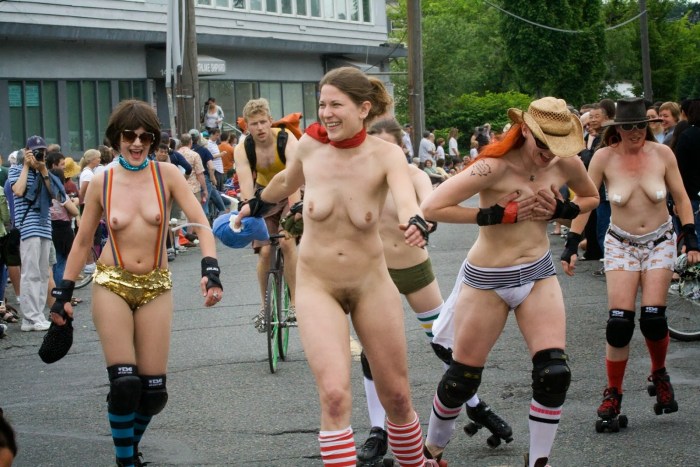 Parade of naked men and women