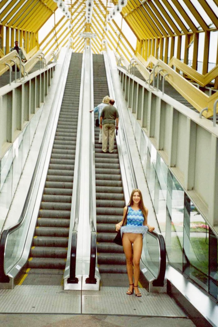 Naked women on the escalator