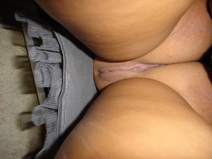 Under a skirt without panties close -up