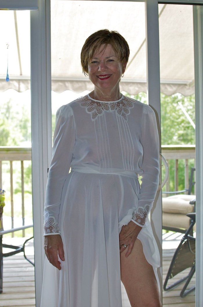 Mature in a transparent dress
