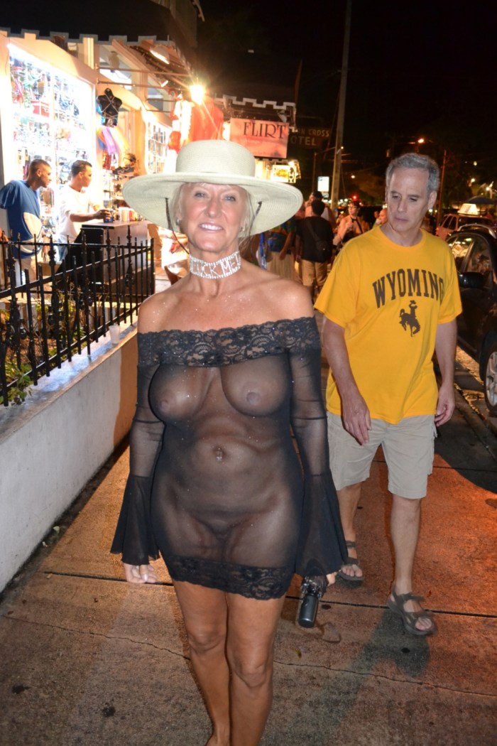 Naked old women in transparent dresses