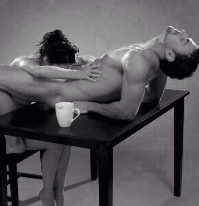 Beautiful erotic poses on the table