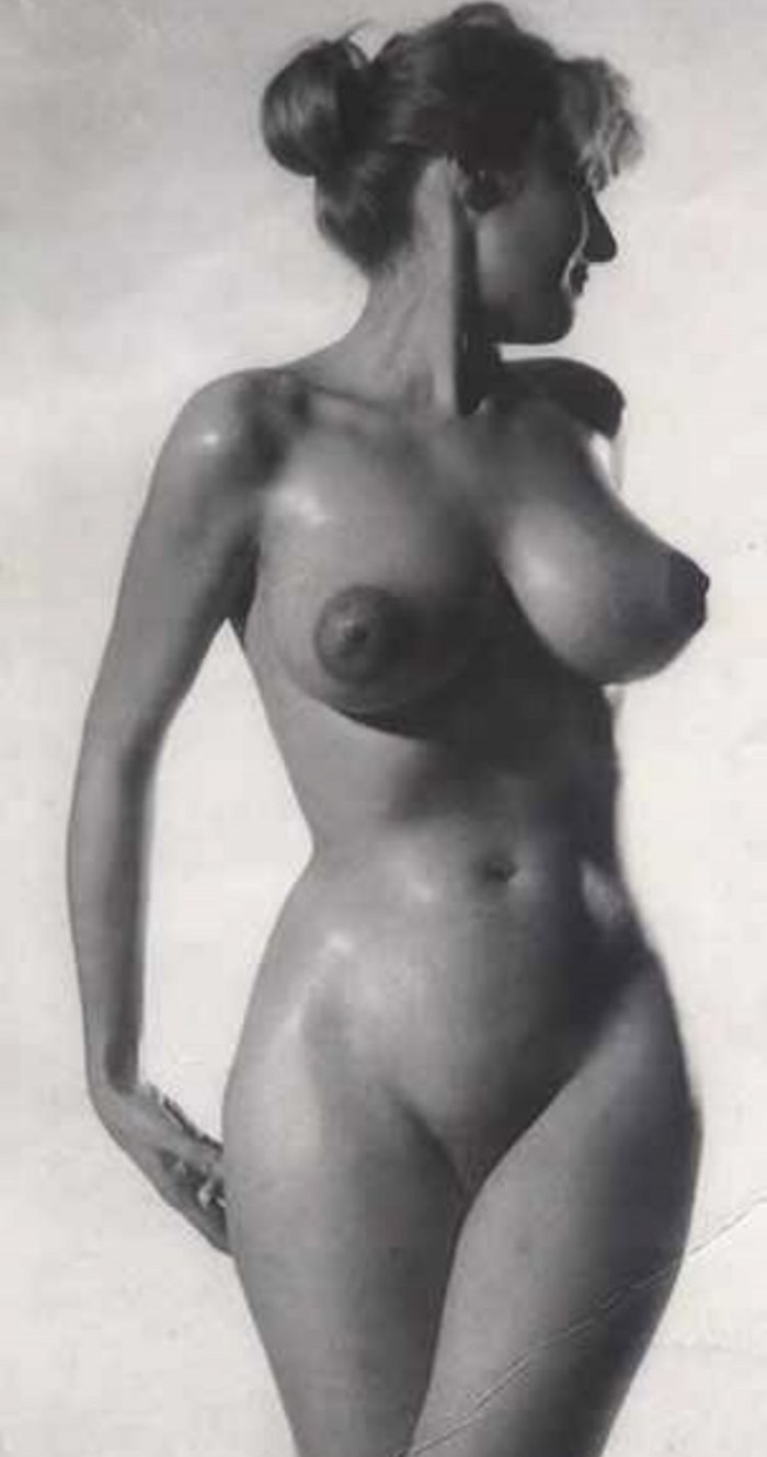 Naked women with a sand clock