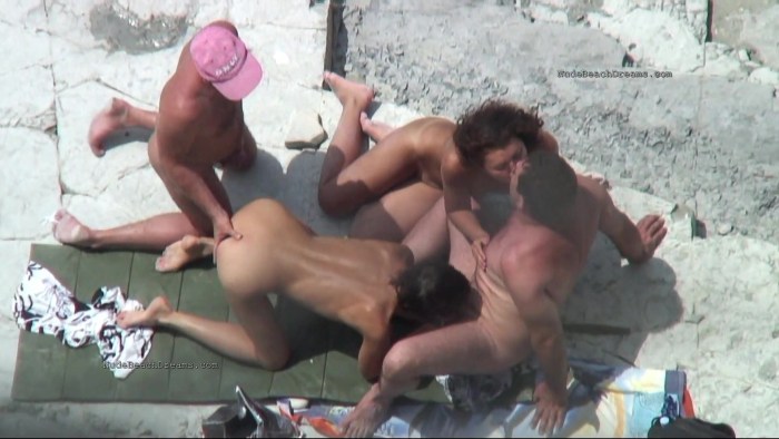 Swingers on the beach spied