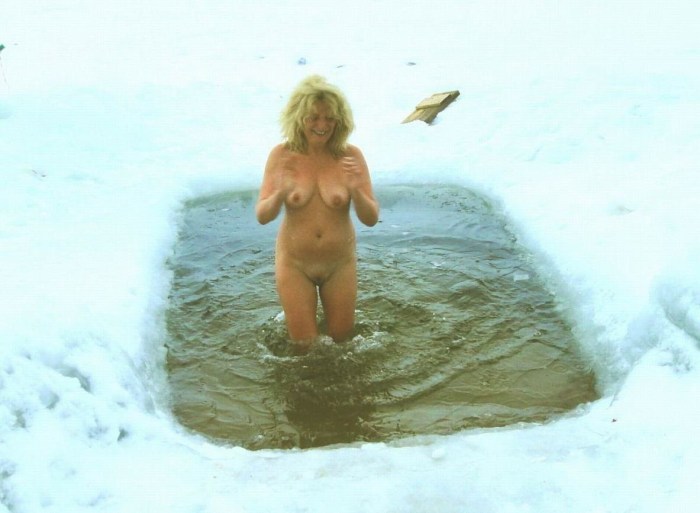 Naked women bathe in the hole
