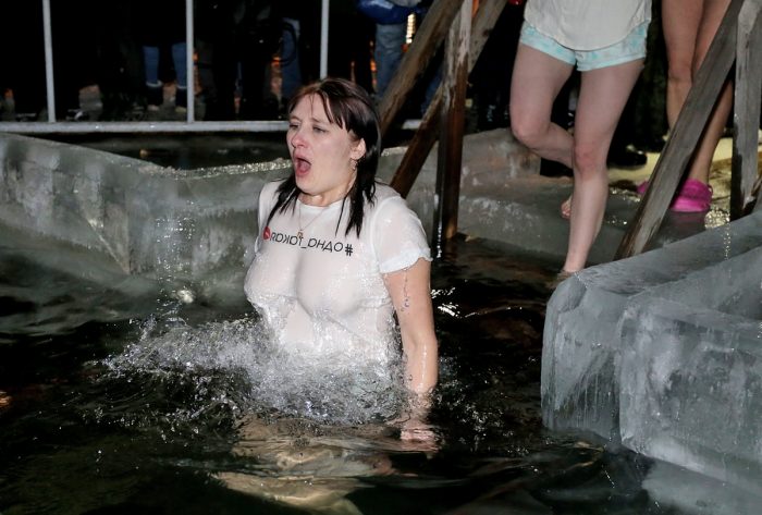 Bathing in the hole for baptism