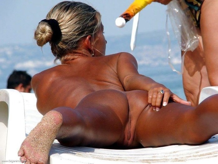 Dark pussy on the beach