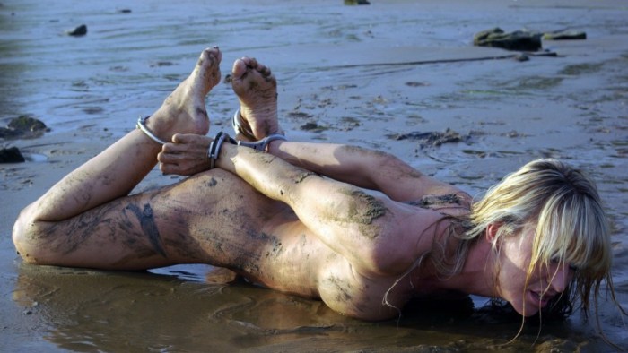 Girl slave in mud