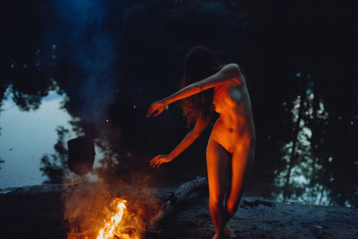 Girls naked by the fire